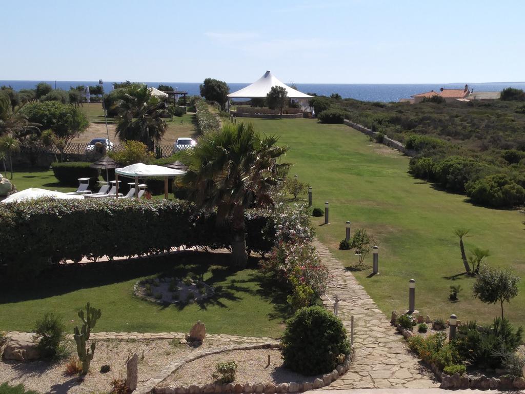 Hotel Raffael Putzu Idu Esterno foto