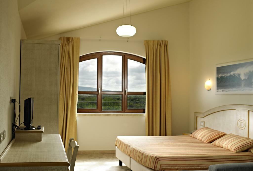 Hotel Raffael Putzu Idu Esterno foto